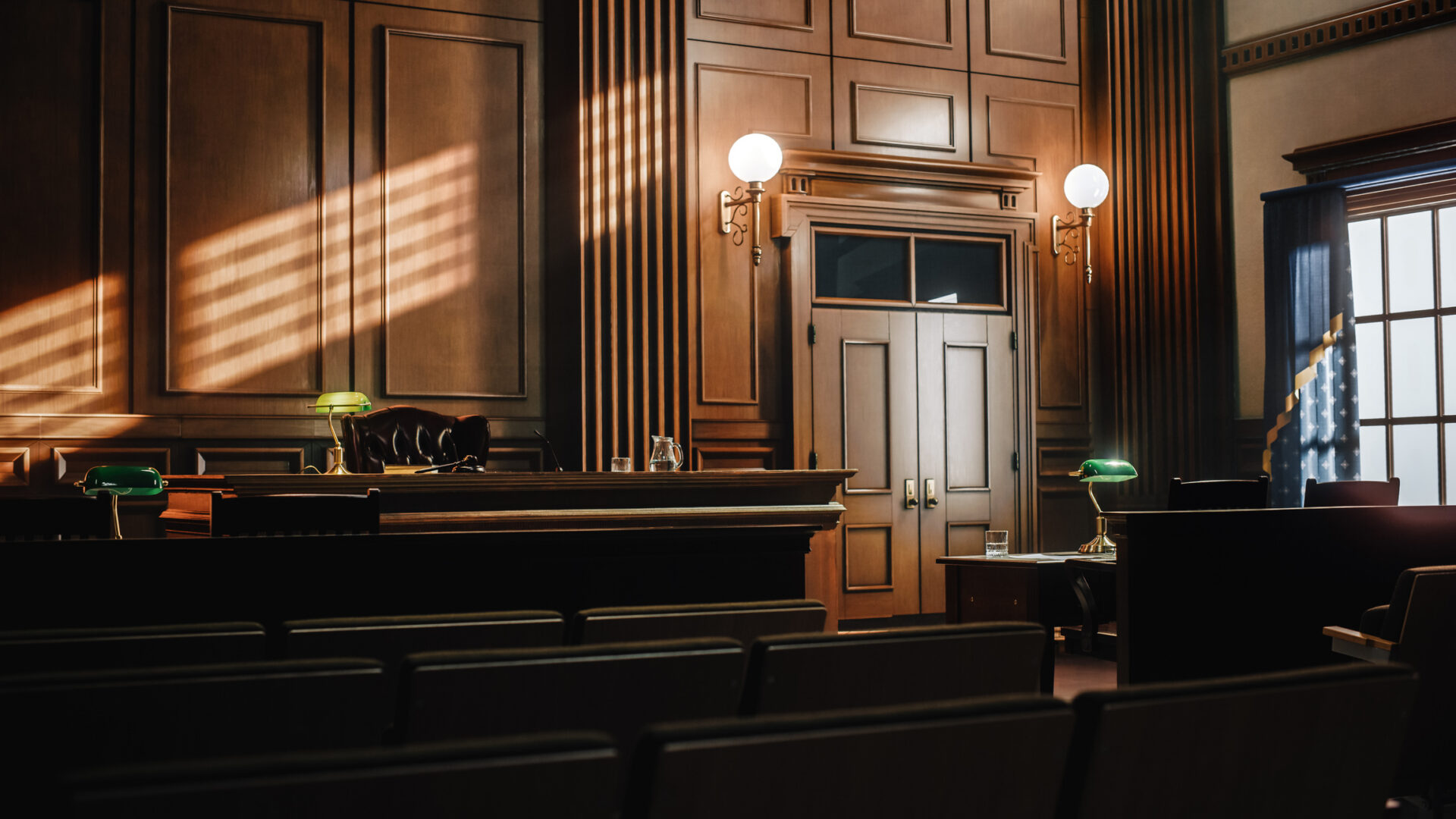 Empty American Style Courtroom. Supreme Court of Law and Justice Trial Stand. Courthouse Before Civil Case Hearing Starts. Grand Wooden Interior with Judge's Bench, Defendant's and Plaintiff's Tables.